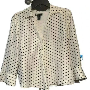 Carole Little black and white wrap blouse 3/4 flare sleeve with tie closure.